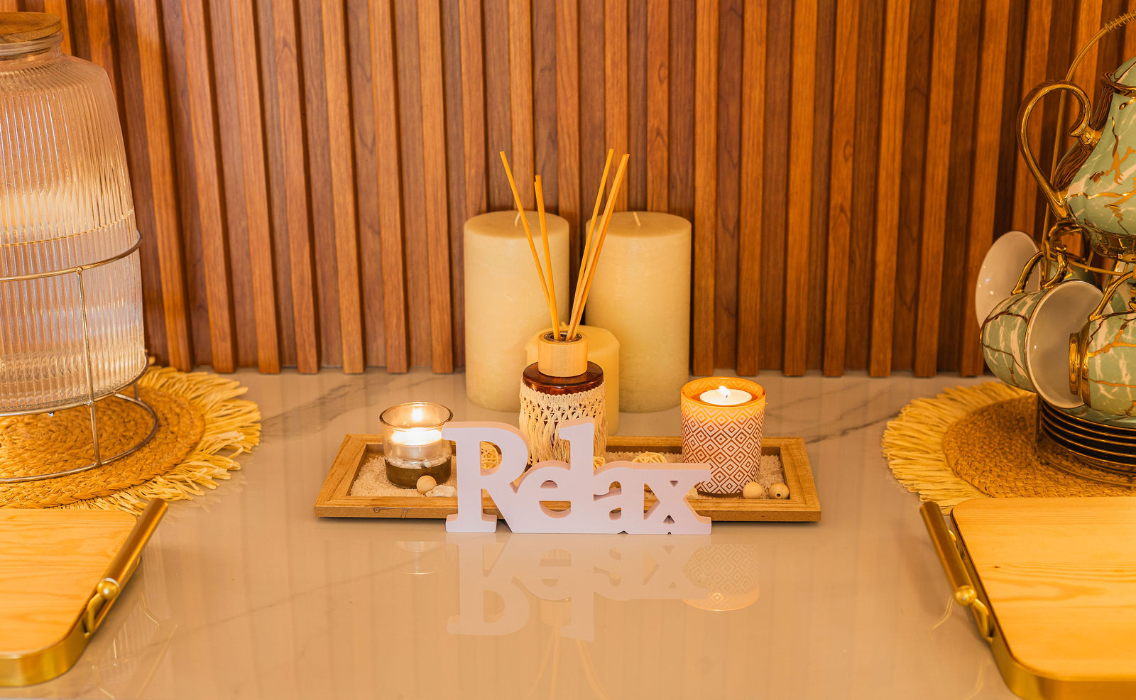Wellness tray with candles, diffuser and the word Relax